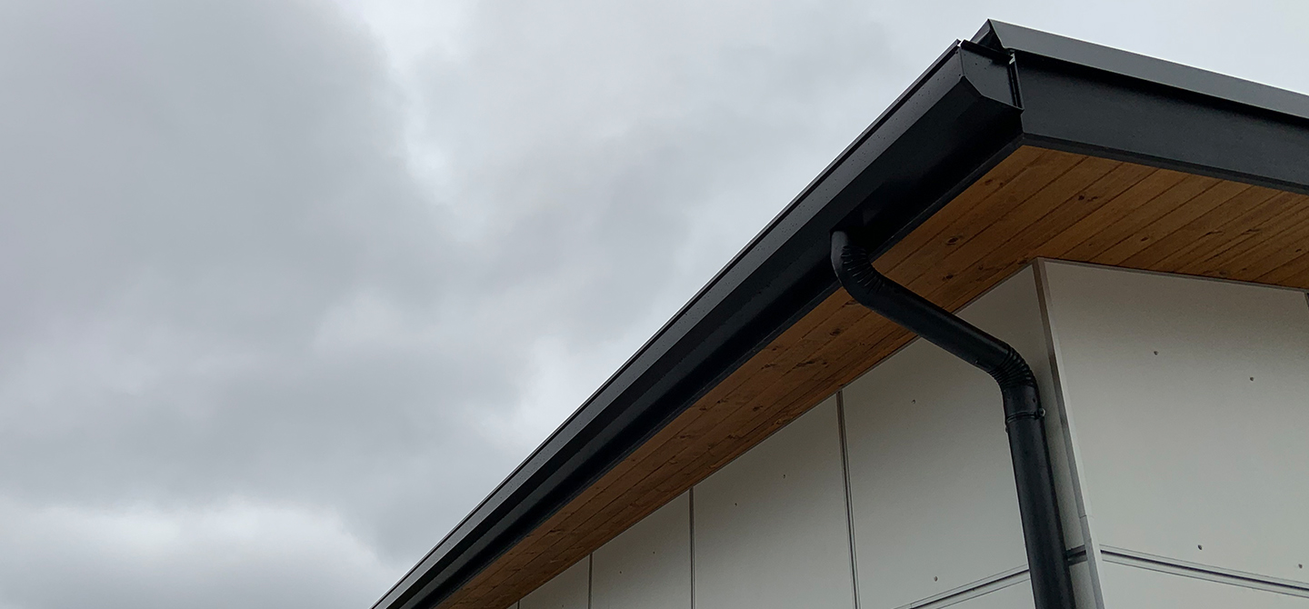 black gutter and rain drain pipe golena mo