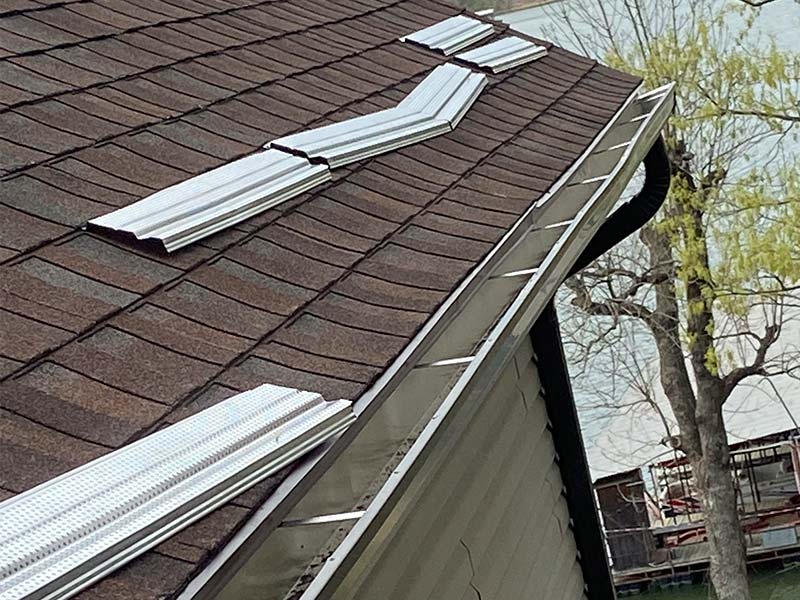pieces of leaf guard along roof to be installed golena mo